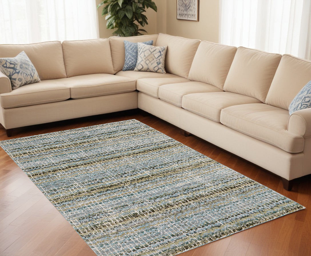 8’ X 11’ Blue and Ivory Abstract Power Loom Area Rug - Area Rugs